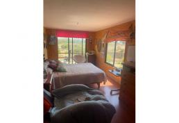 Parcela con casa en Tunquen