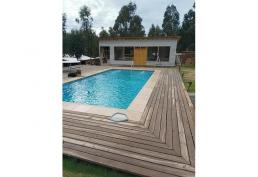 PARCELA CON VANGUARDISTA CASA EN EL TOTORAL