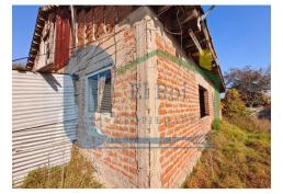 TERRENO PLANO CON CASA DE CONTRUCCION SOLIDA PARA REMODELAR