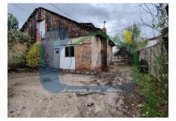 TERRENO PLANO CON CASA DE CONTRUCCION SOLIDA PARA REMODELAR