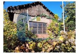 SE VENDE TERRENO PLANO CON CASA DE CONTRUCCION SOLIDA PARA REMODELAR