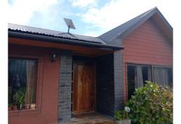 Se vende parcela con casa habitacion y local comercial en condominio