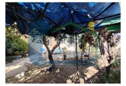 TERRENO PLANO CON CASA DE CONSTRUCCION SOLIDA PARA REMODELAR