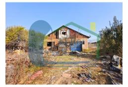 TERRENO PLANO CON CASA DE CONTRUCCION SOLIDA PARA REMODELAR