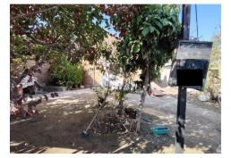 TERRENO PLANO CON CASA DE CONSTRUCCION SOLIDA PARA REMODELAR