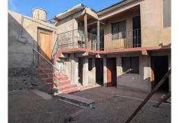 VENDO TERRENO CON CASA- ARICA CENTRO-oportunidad